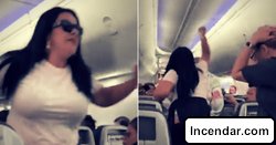 Angry woman smashes laptop on boyfriend's head for 'looking at other women' while boarding American Airlines flight