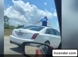 FHP: Florida man driving Cadillac from sunroof says hed rather go to jail than back to his wife